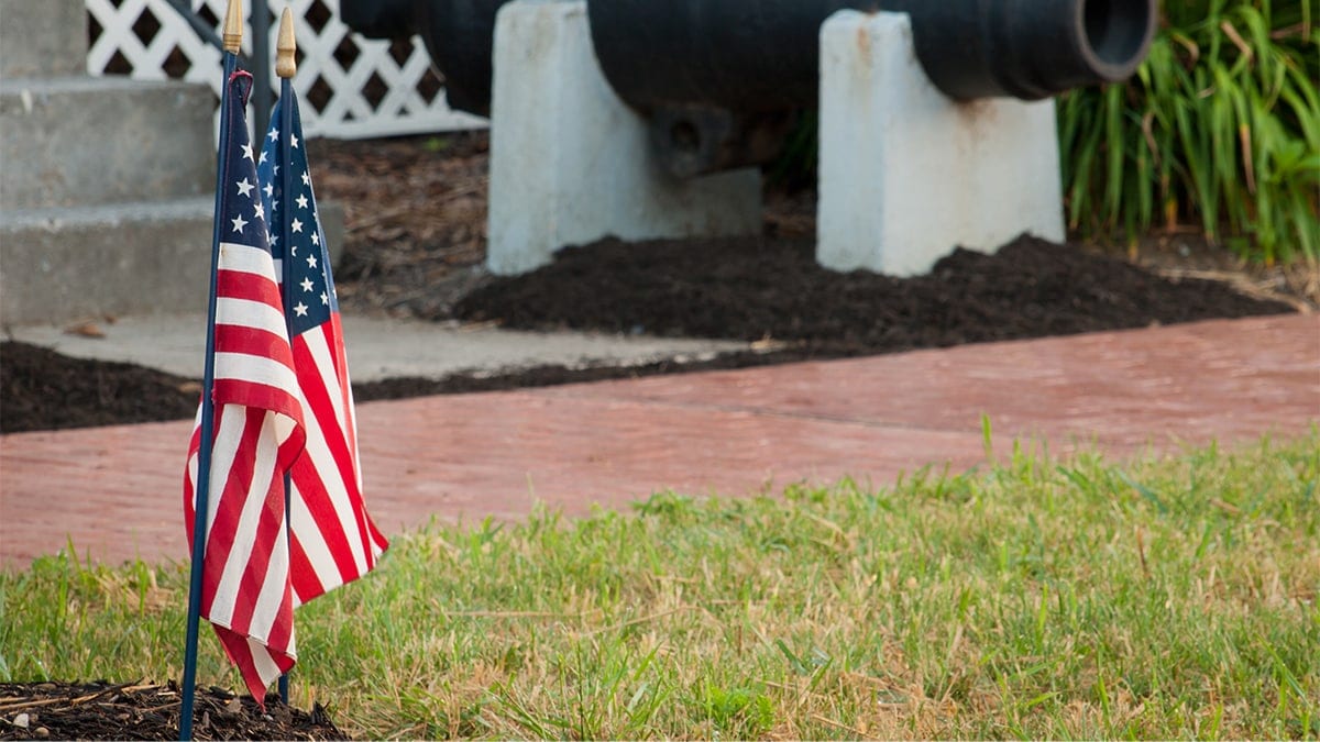 A country flag outside the home of a veteran on memorial day