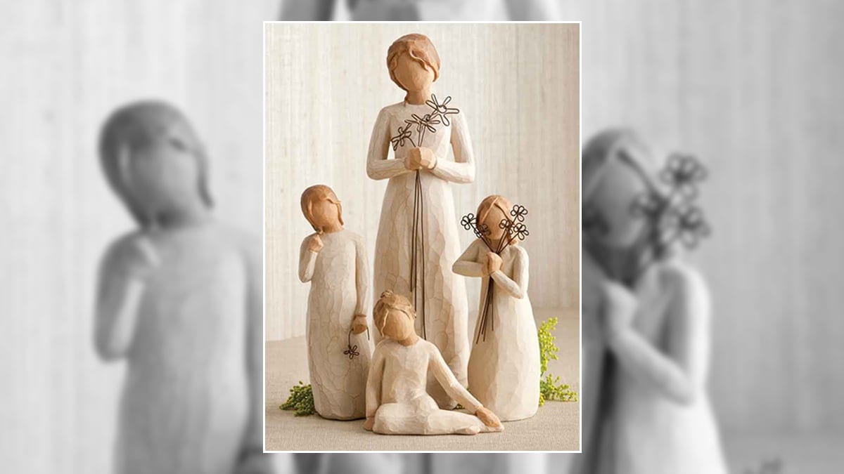 an image of three girls with their mom. The figurines are pretty and a gift for memorial for the loss of a mother