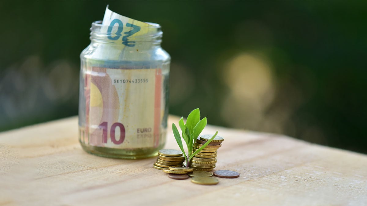 a jar with money filled in it