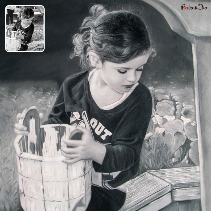 Black and white picture of a girl holding a wooden bucket in her hand