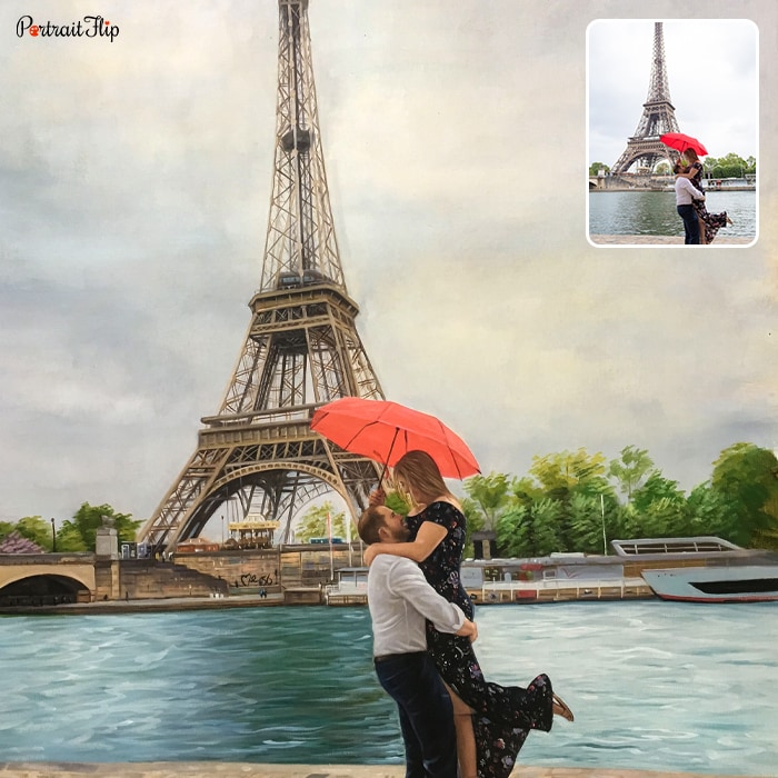 Acrylic painting of a couple where the man lifts the woman in her arms and woman is holding a red umbrella in her hand with Eiffel tower in background