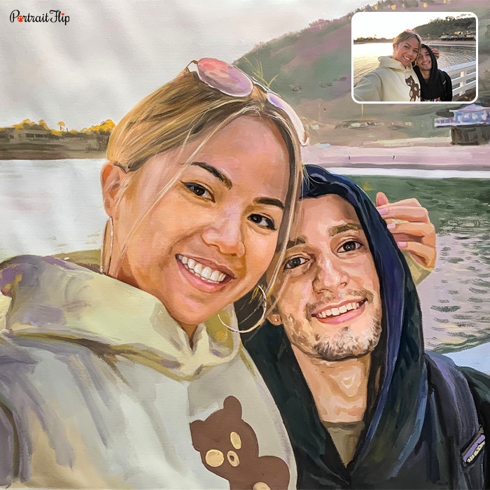Anniversary portraits where a woman is taking selfie with a man and a lake view in background