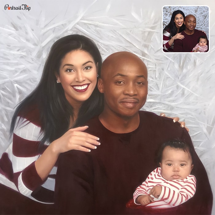 Christmas portraits where a man is holding a baby in his arms with a woman standing behind him