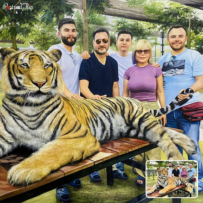 Picture of a tiger sitting on a table with four men and a woman behind him