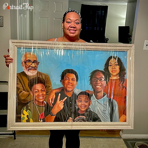 Picture of a woman holding Grandparents and Grandchildren Portraits that show an old man, four boys, and a woman in corner