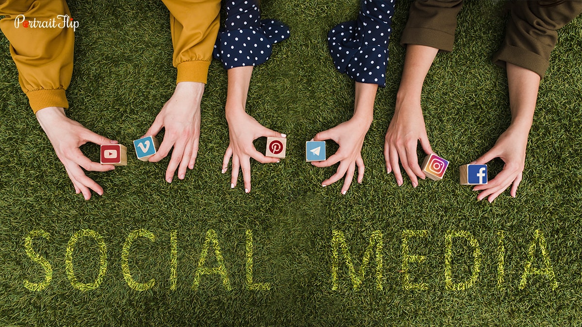 Three pair of hands showing the logo of social media platform that can be used for wedding portrait painter