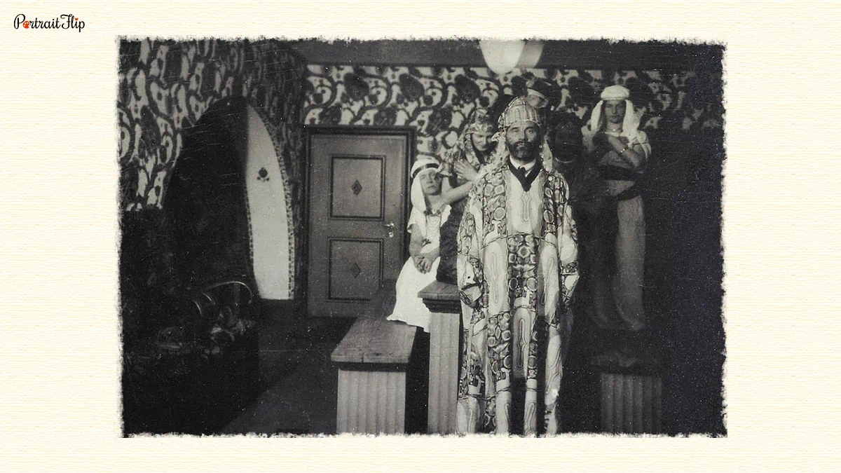 Gustav Klimt wearing a designer coat at a house party. 