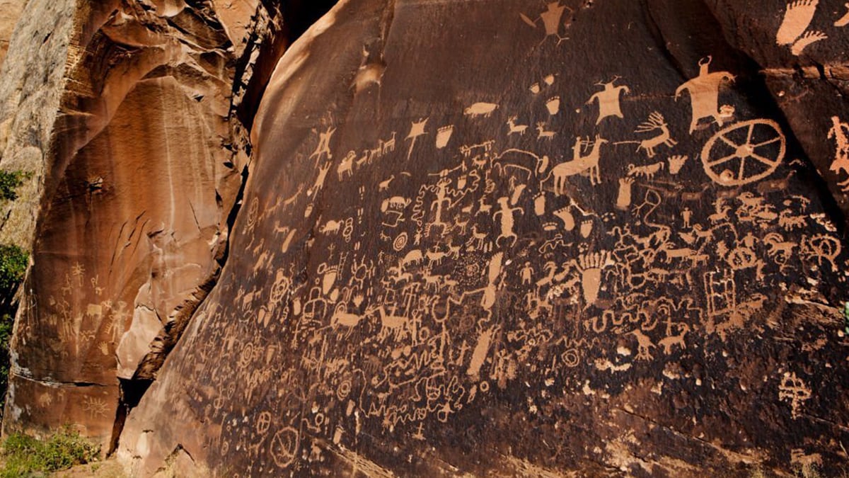 ancient carvings on old cave walls.