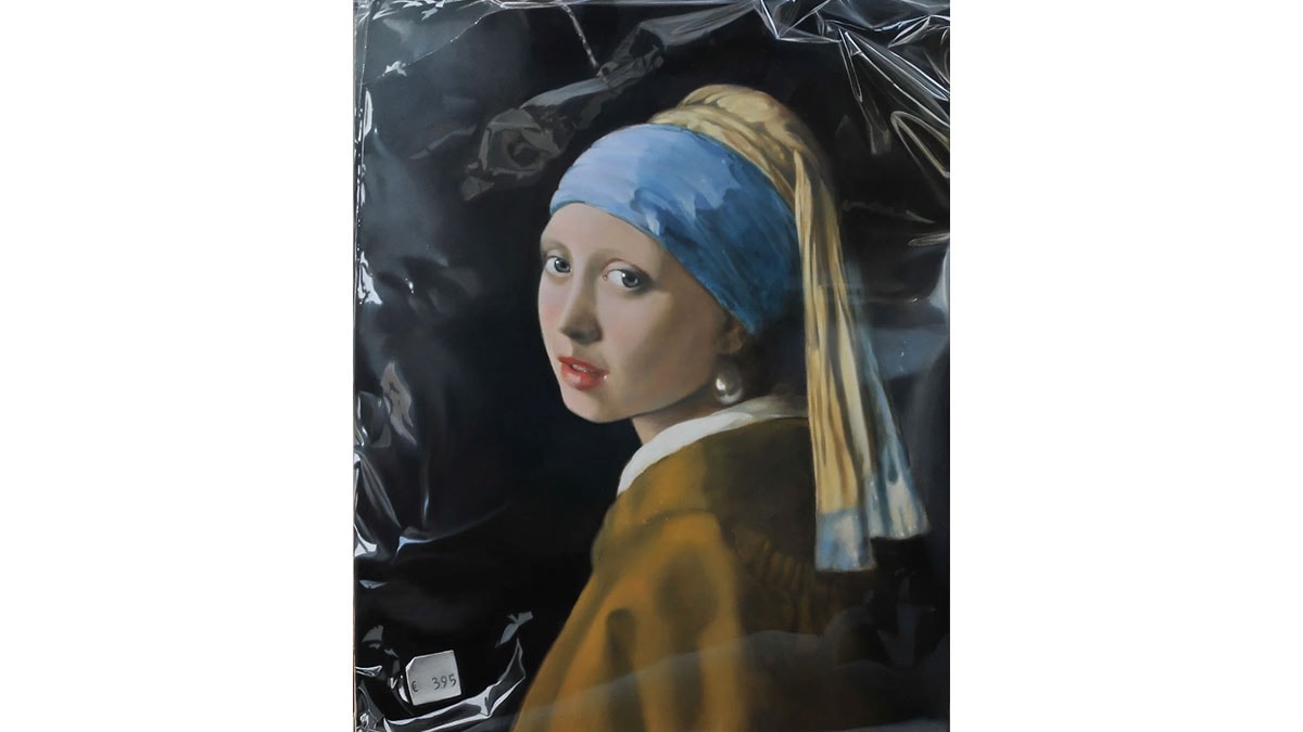 Girl with a Pearl Earring in Plastic by Tjalf Sparnaay which is one of the famous hyperrealism art