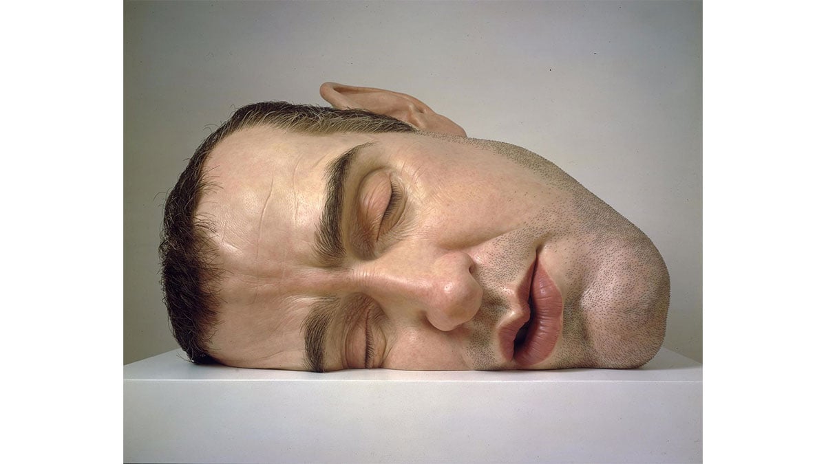 Ron Mueck's hyperrealism art showing a huge man's face