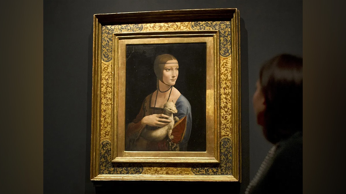 Da Vinci's Lady with an Ermine painting framed in a museum