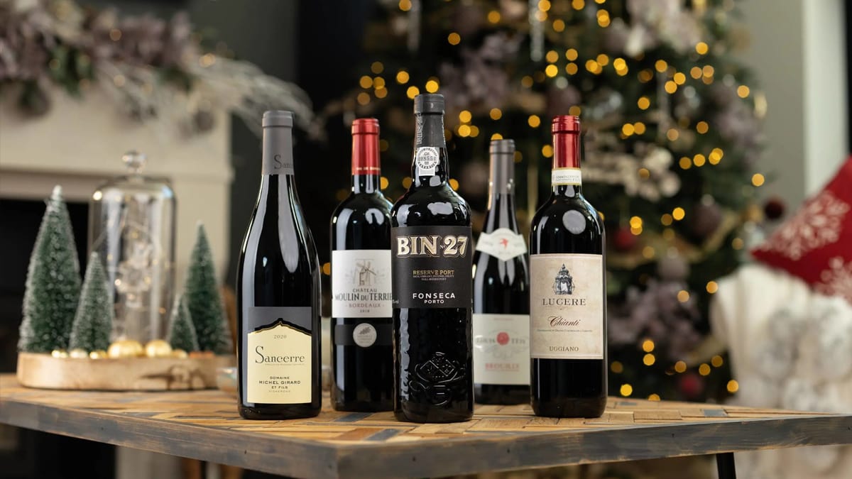Bottle of wines placed on table as Christmas gifts for grandpa