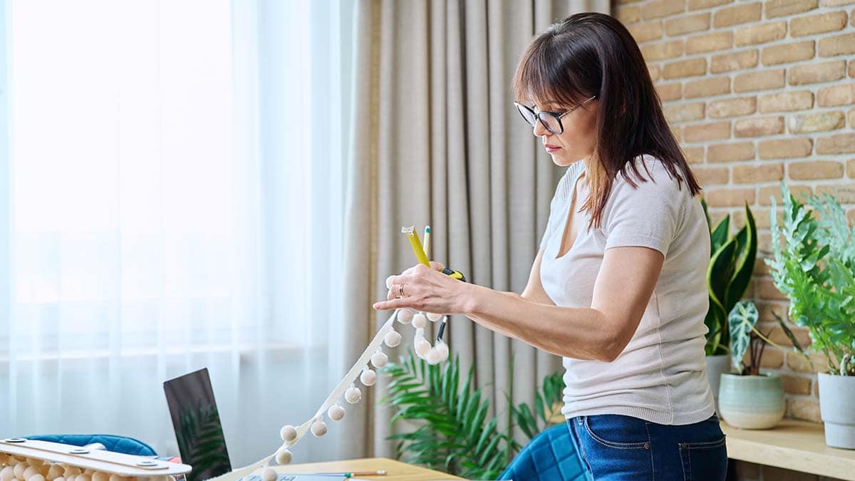A woman making designs