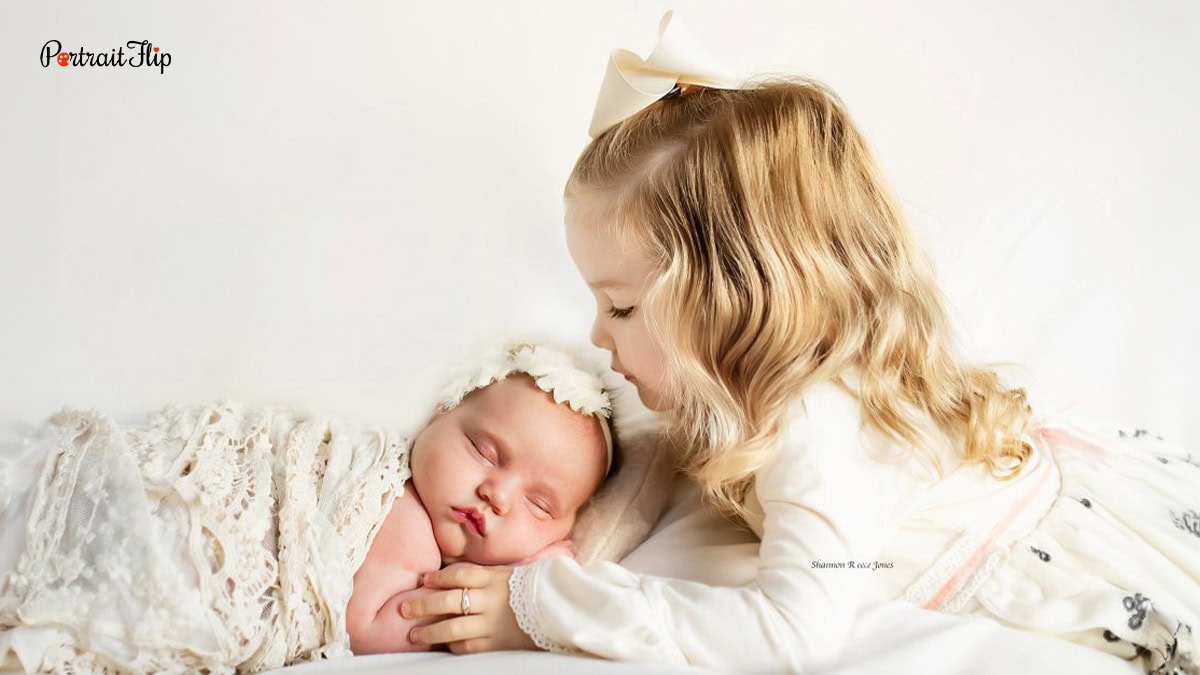 newborn baby with sibling