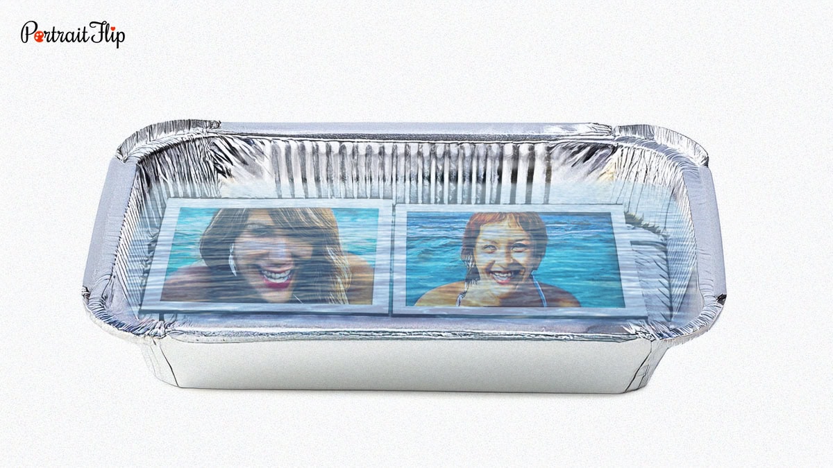 Restoring water damaged photos- soak them in water
