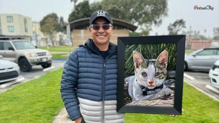 happy customer with acrylic cat portrait