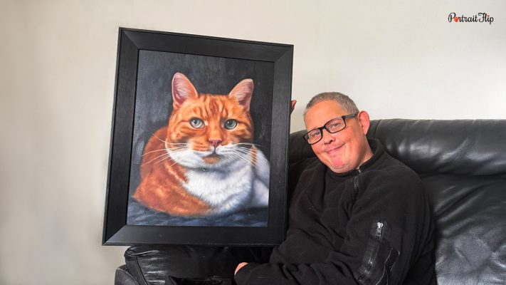 happy customer with oil cat painting