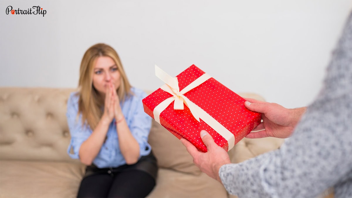 a lady receiving gift