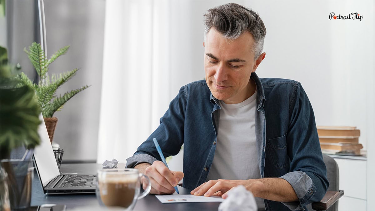a man writing letter