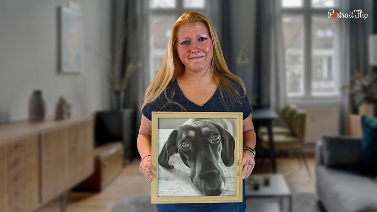 a lady holding a pet portrait