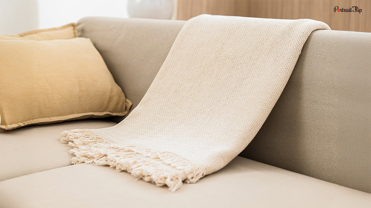handwoven blank lying on the sofa