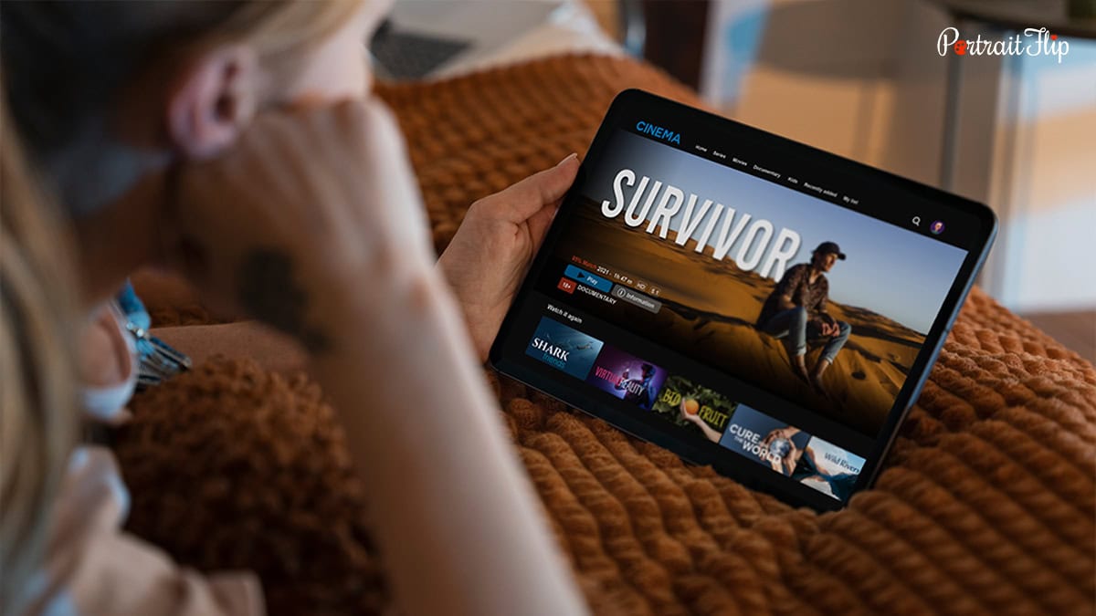 Person watching movie on a ipad