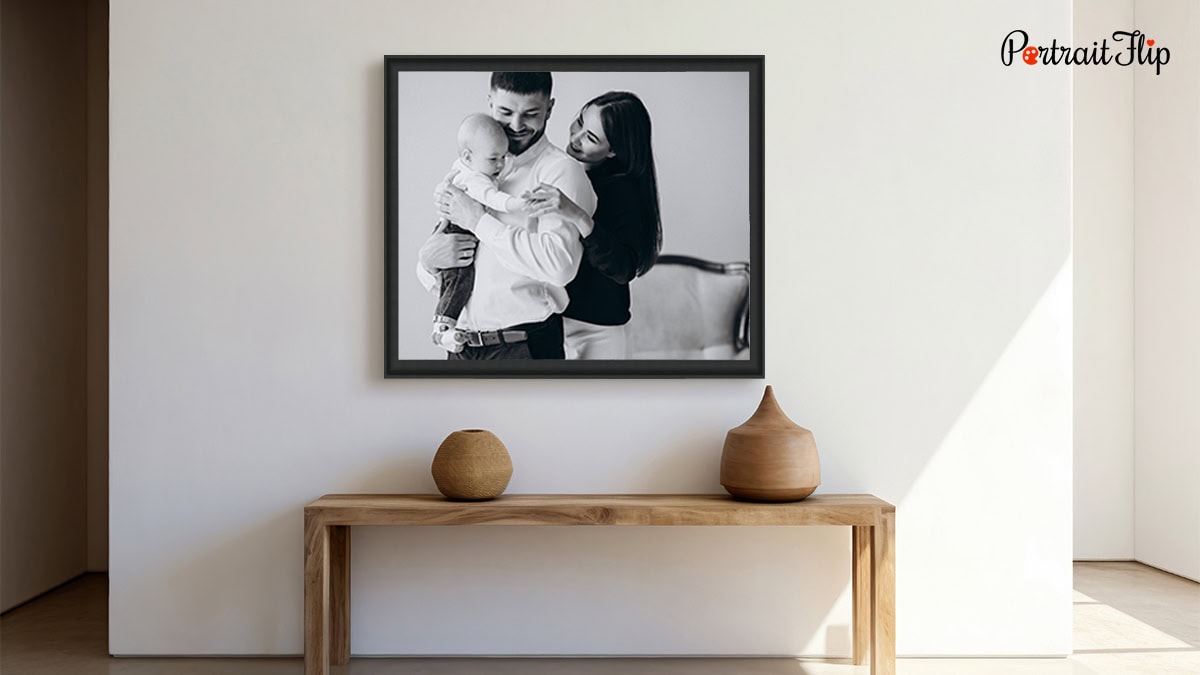 Black and white photo frame mounted on a wall