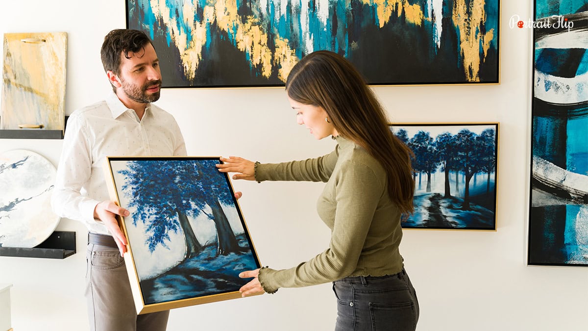 A woman taking a glance at a handmade artwork