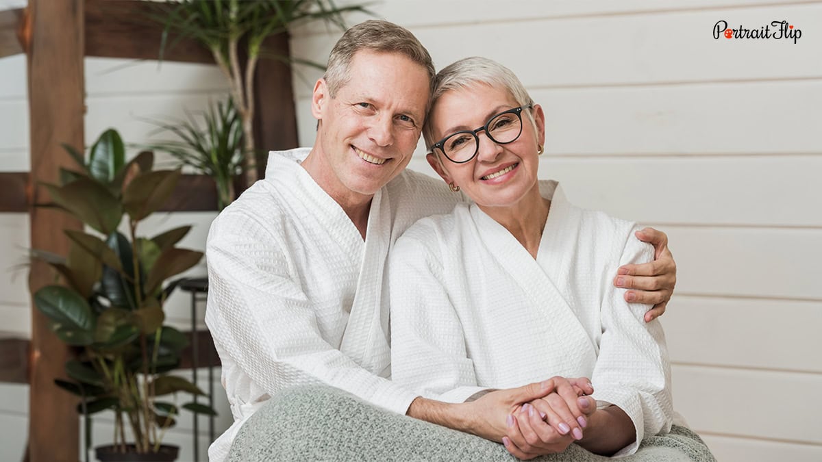 An old couple posing in a spa day or Wellness Experience